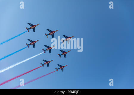 Patrouille de France (French Acrobatic Patrol) with blue white and red smoke Stock Photo