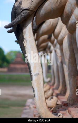 Close up picture of tasks and trunks of the elephant statues at Wat Chang Lom in Sukhothai's Historical Park, Thailand Stock Photo