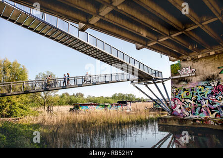Graffiti on Zuiderzeeweg bridge in IJ river. Amsterdam, The Netherlands. Stock Photo