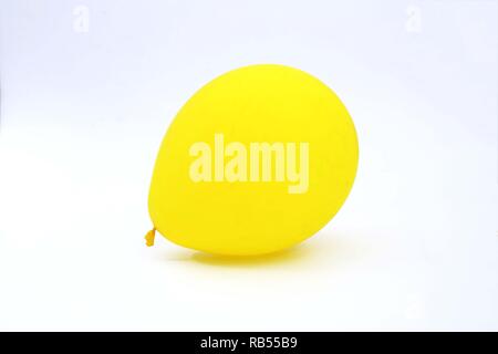 Portrait of yellow balloon. Isolated on the white background. Stock Photo