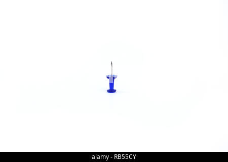Picture of blue paper pin. Isolated on the white background. Stock Photo