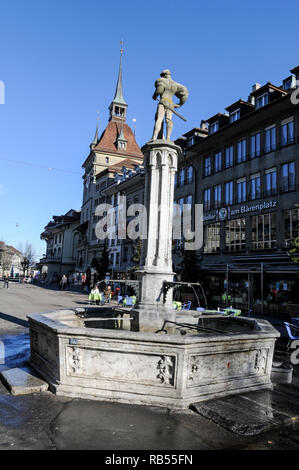 A Bärenplatz water fountain on Barenplatz, (Beer Place) in the Old Town of  Bern Switzerland. Stock Photo