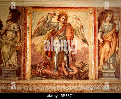 Italy Basilicata Montescaglioso San Michele abbey-library of the abbot frescoes - Saint Michael Archangel  - to left the Faith and  right Mercy Stock Photo