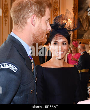 Prince Harry and Meghan, The Duke and Duchess of Sussex, attend a reception for 100 members of the Royal airforce at Buckingham Palace in London, England on July 10th 2018 to celebrate a the centenary of the Royal Air Force. Stock Photo