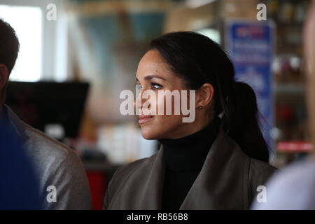 Prince Harry, Duke of Sussex and Meghan, Duchess of Sussex depart after a meeting with young people in the Mental Health Sector at Maranui Cafe on October 29, 2018 in Wellington, New Zealand. Stock Photo