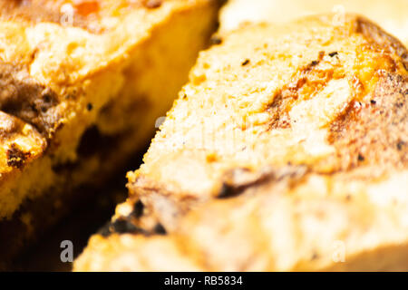 closeup on a crumb cake stuffed with strawberry marmalade, delicious dessert Stock Photo