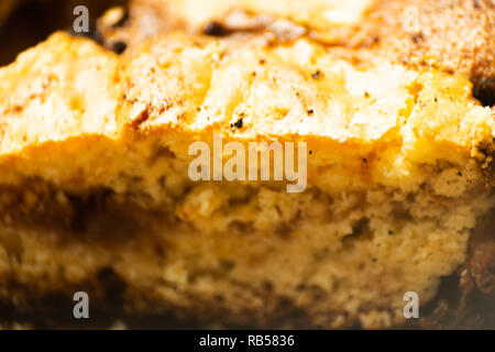 closeup on a crumb cake stuffed with strawberry marmalade, delicious dessert Stock Photo