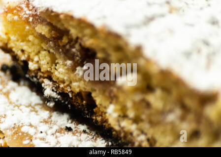 closeup on a crumb cake stuffed with strawberry marmalade, delicious dessert Stock Photo