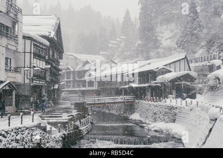 Ginzan Onsen, a traditional village in Tohoku, Japan, during a snow storm Stock Photo