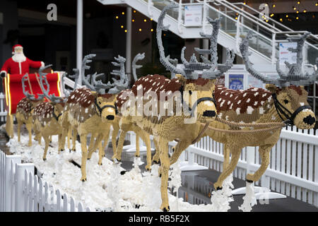A Santa Sleigh with 8 reindeer made using 750,000 LEGO bricks at Tacoma Square, Mermaid Quay, Cardiff Bay. The models took 3 months, to build and will Stock Photo