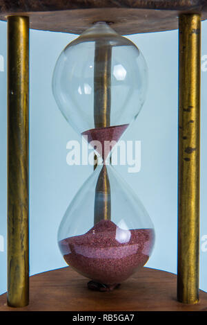 Old Hourglass sand flow time passing Stock Photo - Alamy