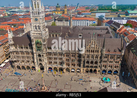 Great aerial view of Munich's New Town Hall (Neues Rathaus) and Mary's Square (Marienplatz), the popular pedestrian zone with the Marian column... Stock Photo