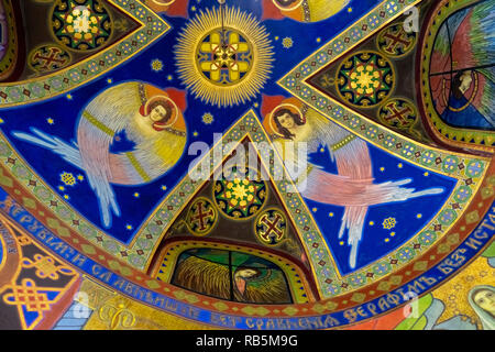 ZHOVKVA, UKRAINE : Fresco decoration with angels painted by artist J. Bucmaniuk on the ceiling of a chapel in the Ukrainian Greek Catholic Church Stock Photo