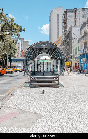 Curitiba - PR, Brazil - December 14, 2018: Entrance of the tubular bus stop of Curitiba. Elevated bus stop station. Public transport stop. Stock Photo