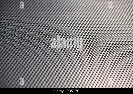 Silver Metallic Background with pattern in diagonal lines and blurred foreground and background. Stock Photo