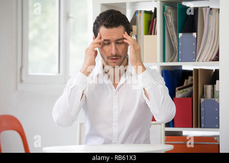 Man suffering from headache. Stock Photo