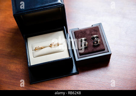 Download Pair Of Cufflinks In A Gift Box On Wooden Background Copy Space Mockup For Design Stock Photo Alamy