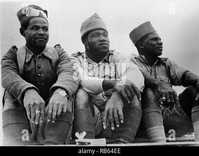 Photograph of three of members of the Free French foreign legion who distinguished themselves in the battle at Bir Hacheim in the Western desert. They are from Senegal, Equatorial Africa, and Madagascar, respectively. Dated 1942 Stock Photo