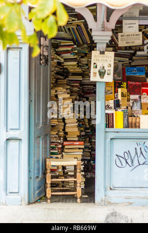 interior of a stall in a city market full of books on Madrid, Spain Stock Photo