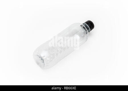 An empty generic single use plastic water bottle on a white background, no label Stock Photo