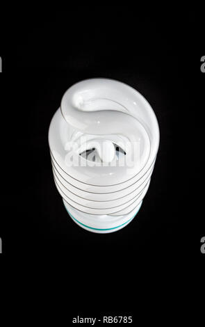 High power energy efficient high power fluorescent photographic light bulb on a black background Stock Photo