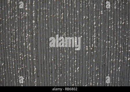 texture of the wall with plaster vertical strips of white color Stock Photo
