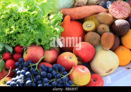 Various fruits and vegetables on a market stall Stock Photo
