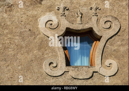 a hexagonal window in one of the houses of Rome, Italy Stock Photo