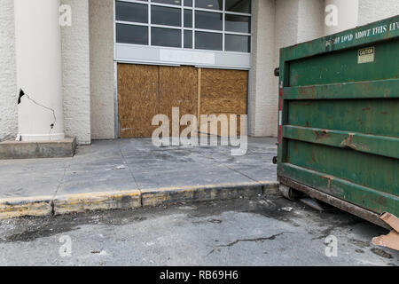 The outline of a logo sign outside of a closed Macy's retail store in Muncy, Pennsylvania, on December 30, 2018. Stock Photo