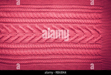 Pink Blush Terracotta Knitted pattern wool sweater texture close up. Handmade red knitting wool texture background Stock Photo