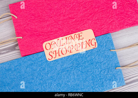 Online shopping inscription on paper bags. Internet shopping concept. Stock Photo