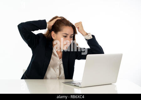 Young beautiful business woman suffering stress working at office computer desk feeling frustrated and tired looking overworked overwhelmed In busines Stock Photo