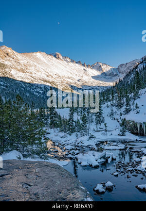 Hiking Trail to a Frozen lake Beneath "The Spearhead" In Glacier Gorge, Rocky Mountain National Park Stock Photo
