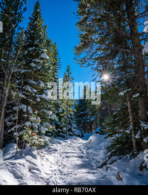 Hiking Trail to a Frozen lake Beneath "The Spearhead" In Glacier Gorge, Rocky Mountain National Park Stock Photo