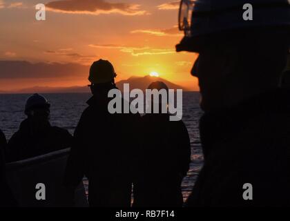 Sailors stand watch on the fo'c'sle of the amphibious transport dock ...