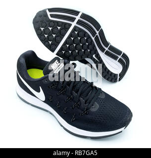 Pair of black Nike Pegasus 33 running shoes cut out isolated on white background Stock Photo