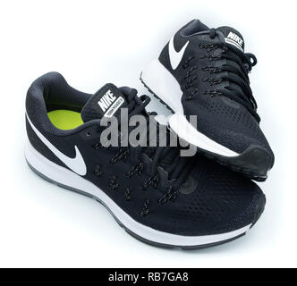 Pair air zoom pegasus 33 of black Nike Pegasus 33 running shoes cut out isolated on
