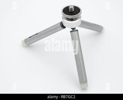 Cut out of a small travel tripod isolated on a white background Stock Photo