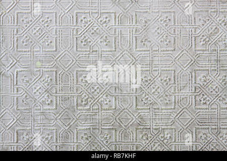 Textured pattern in pressed tin with pale green imperfections Stock Photo