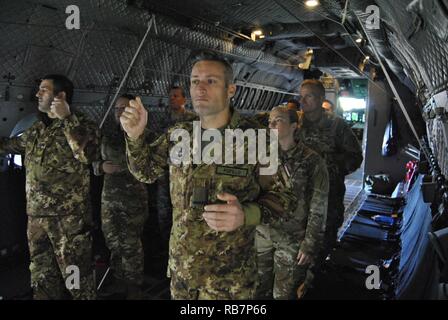 Paratroopers participate in jump master training, prior to Operation Toy Drop, at Pope Airfield, on Fort Bragg, NC, on December 6, 2016.  Operation Toy Drop is a collective training and airborne operation conducted by U.S. and foreign jump masters.  This year, eight nations will conduct airborne operations from December 8 through December 16, 2016. Stock Photo