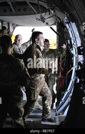 Paratroopers participate in jump master training, prior to Operation Toy Drop, at Pope Airfield, on Fort Bragg, NC, on December 6, 2016.  Operation Toy Drop is a collective training and airborne operation conducted by U.S. and foreign jump masters.  This year, eight nations will conduct airborne operations from December 8 through December 16, 2016. Stock Photo