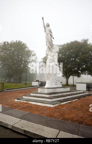 Monument to the Immigrant statue along the waterfront in downtown New Orleans created by Franco Alessandrini Stock Photo