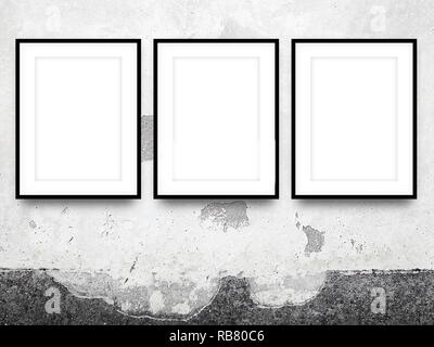 Three blank black picture frames on cracked concrete wall background Stock Photo
