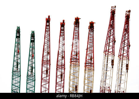 Set of big construction crane for heavy lifting isolated on white background. Construction industry. crane for container lift or at construction site. Stock Photo