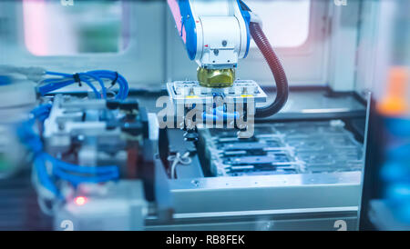 robotic pneumatic piston sucker unit on industrial machine,automation compressed air factory production Stock Photo