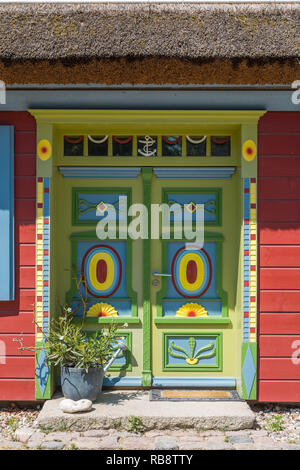 Elaborately crafted and colorful front door