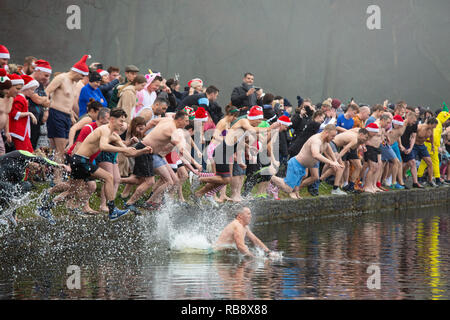 The annual Christmas morning swim at Blackroot Pool, Sutton Park. Stock Photo
