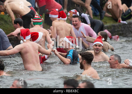 The annual Christmas morning swim at Blackroot Pool, Sutton Park. Stock Photo