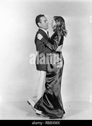 Humphrey Bogart.  1899-1957. American film and stage actor. One of the greatest male movie stars of American cinema. Pictured here with Lauren Bacall. 1924-2014, with whom he was married from 1945 until his death. 1940s Stock Photo