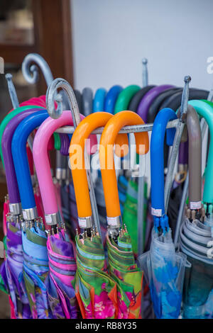 Colorful handles of umbrellas  close-up Stock Photo